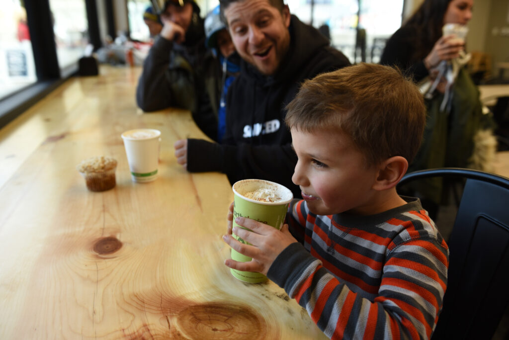 Kid drinking hot coco