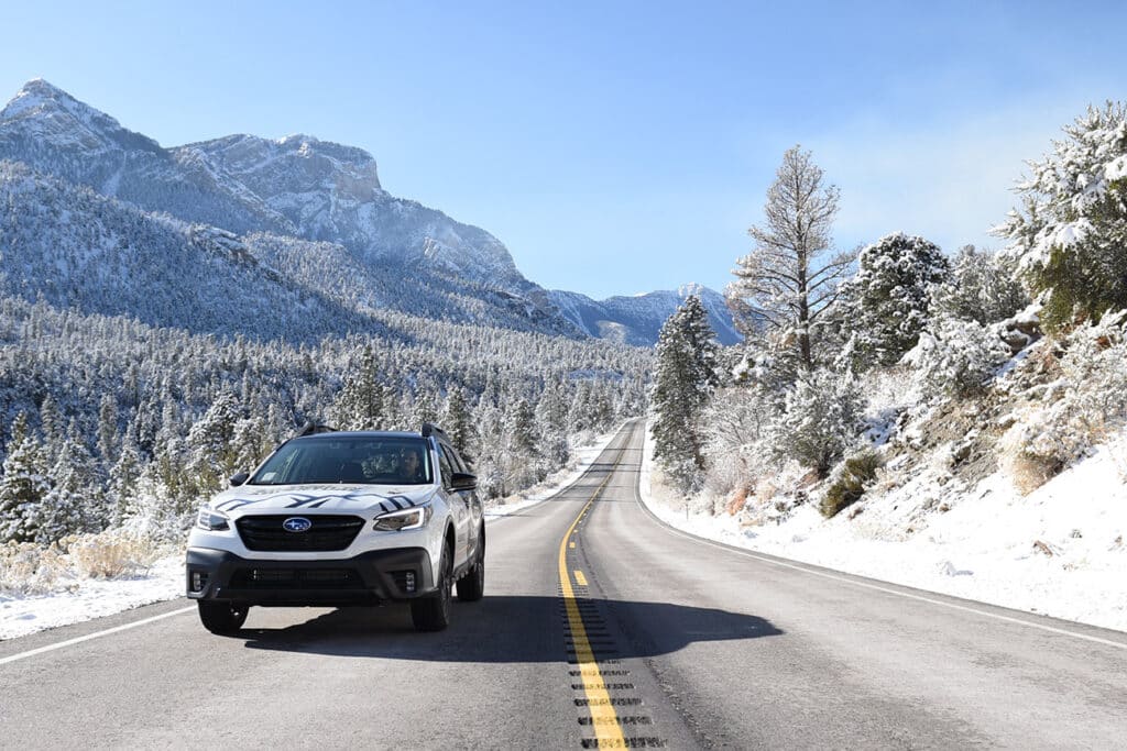 Subaru driving up Lee Canyon road