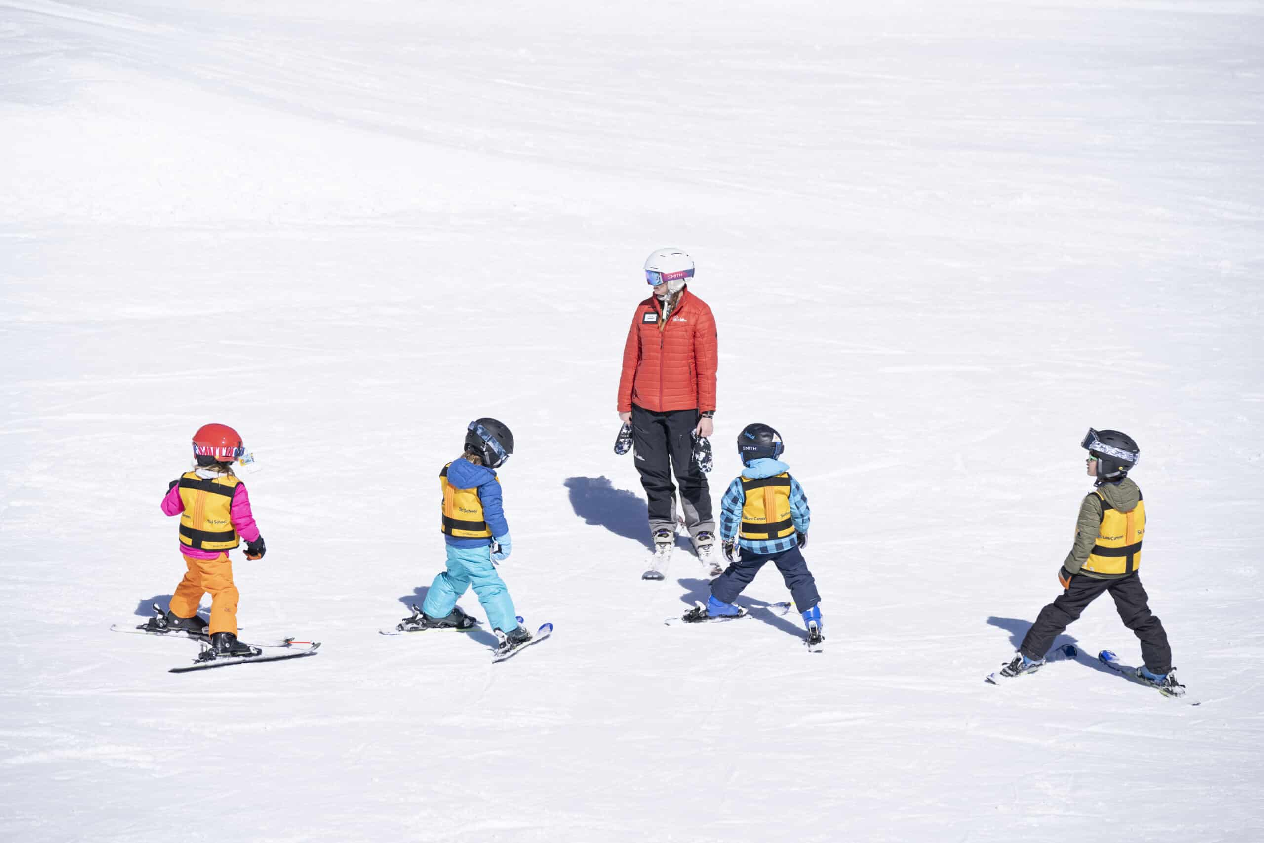 Ski school teaching kids